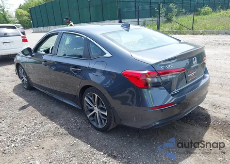 2023 Honda Civic Touring z USA, uszkodzony, nr VIN 2HGFE1F99PH321050